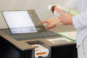 ティーズ（TIS）｜〈世界初〉コンビニのレジに空中で操作する非接触